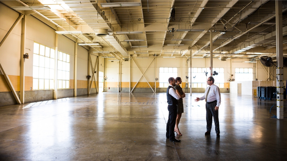 tenant rep broker touring a warehouse