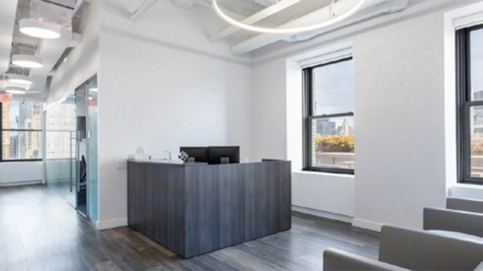 Reception area with two armchairs at 220 E 42nd, New York