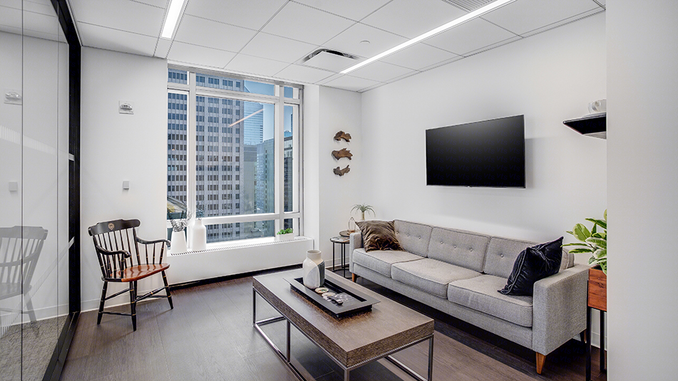 Seating area with sofa at 712 Fifth